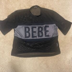 BEBE BLACK/WHITE SPORT MESH Jersey Style SHORT SLEEVE T-SHIRT SIZE XL.